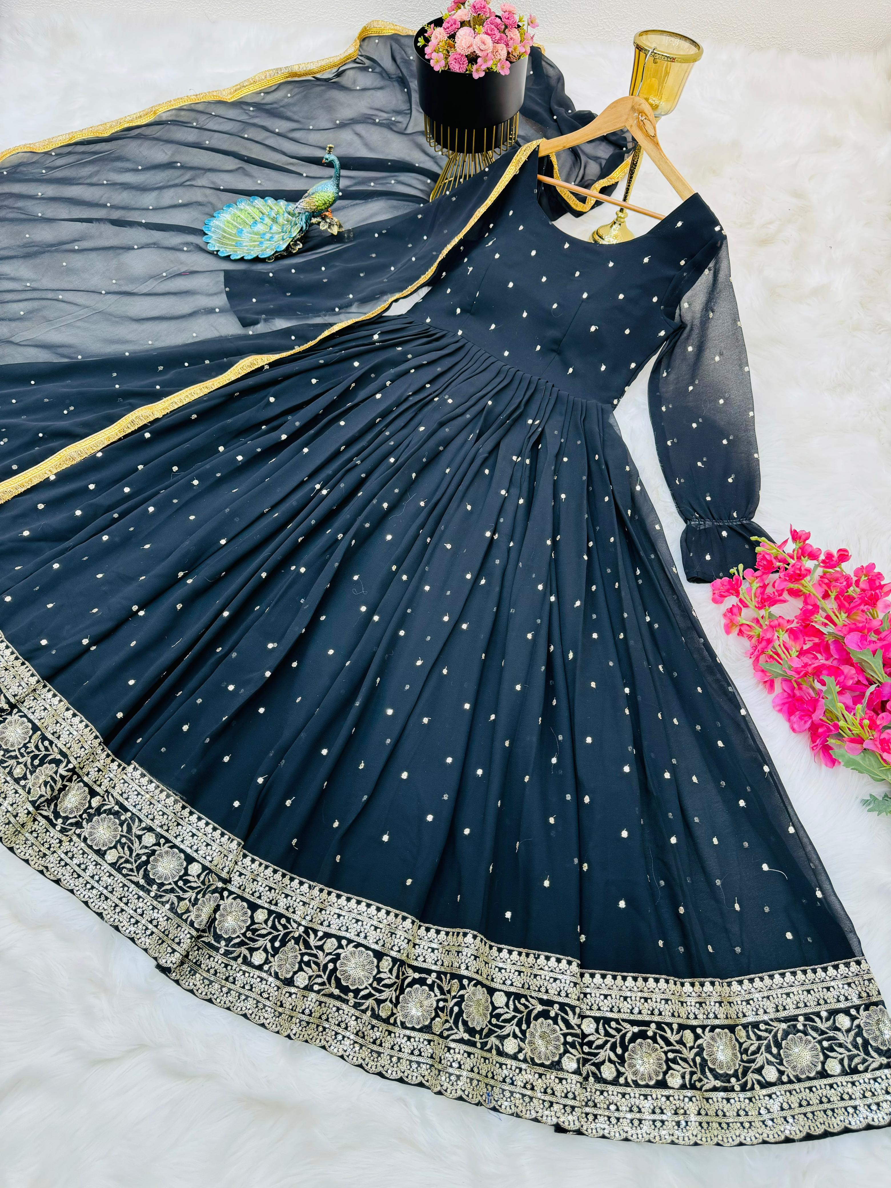 Admiring Black Color Embroidery Work Gown