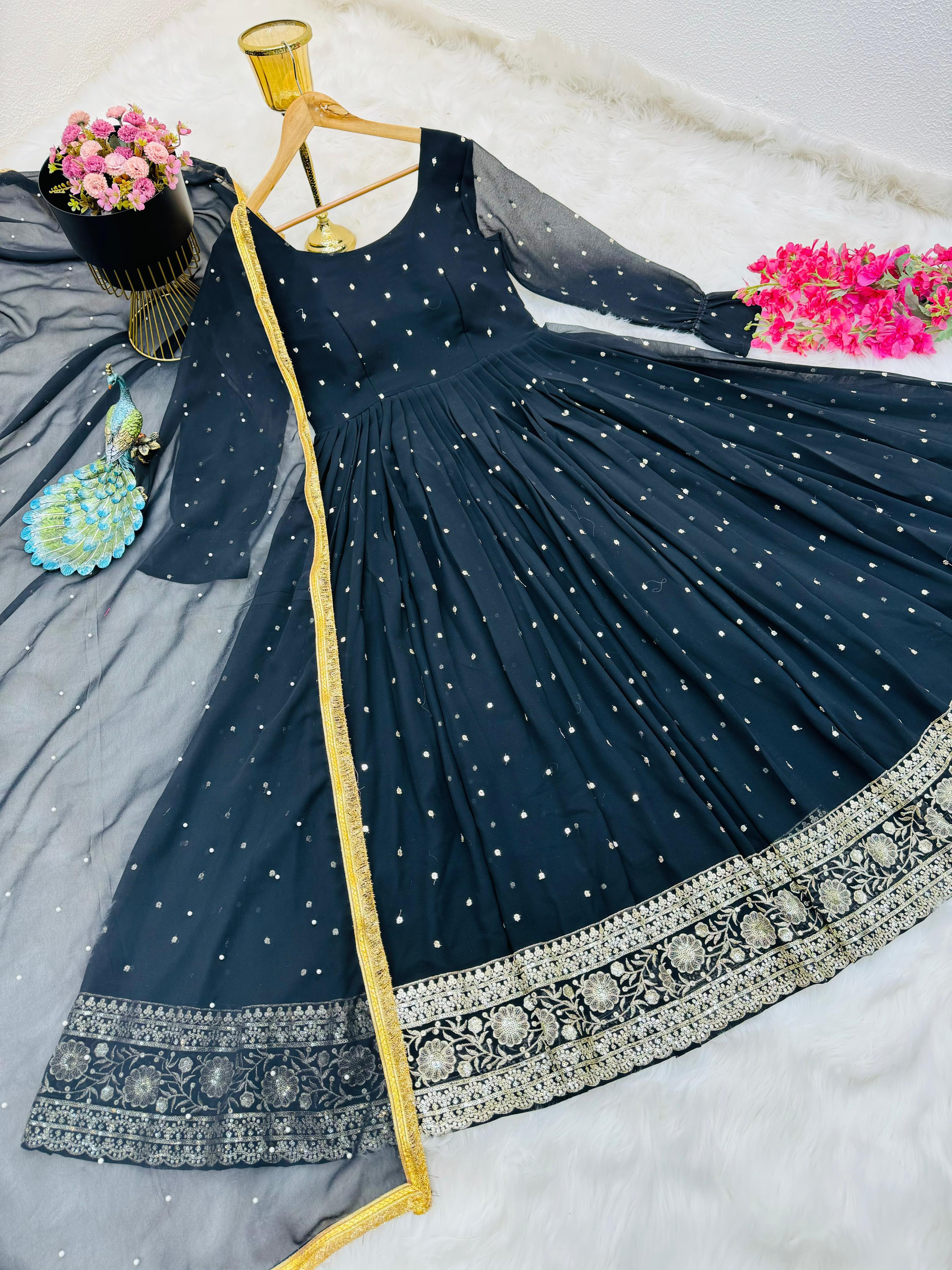 Admiring Black Color Embroidery Work Gown