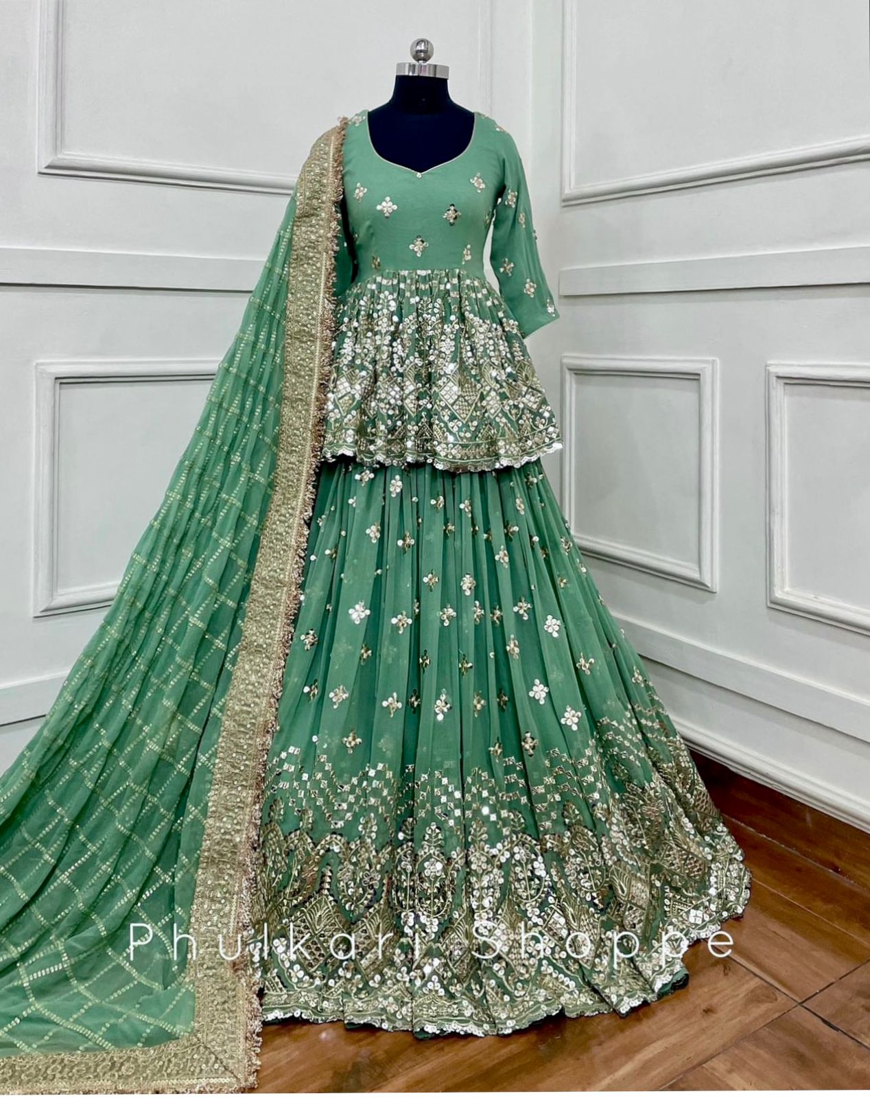 Glorious Embroidery Sequence Work Green Lehenga With Top
