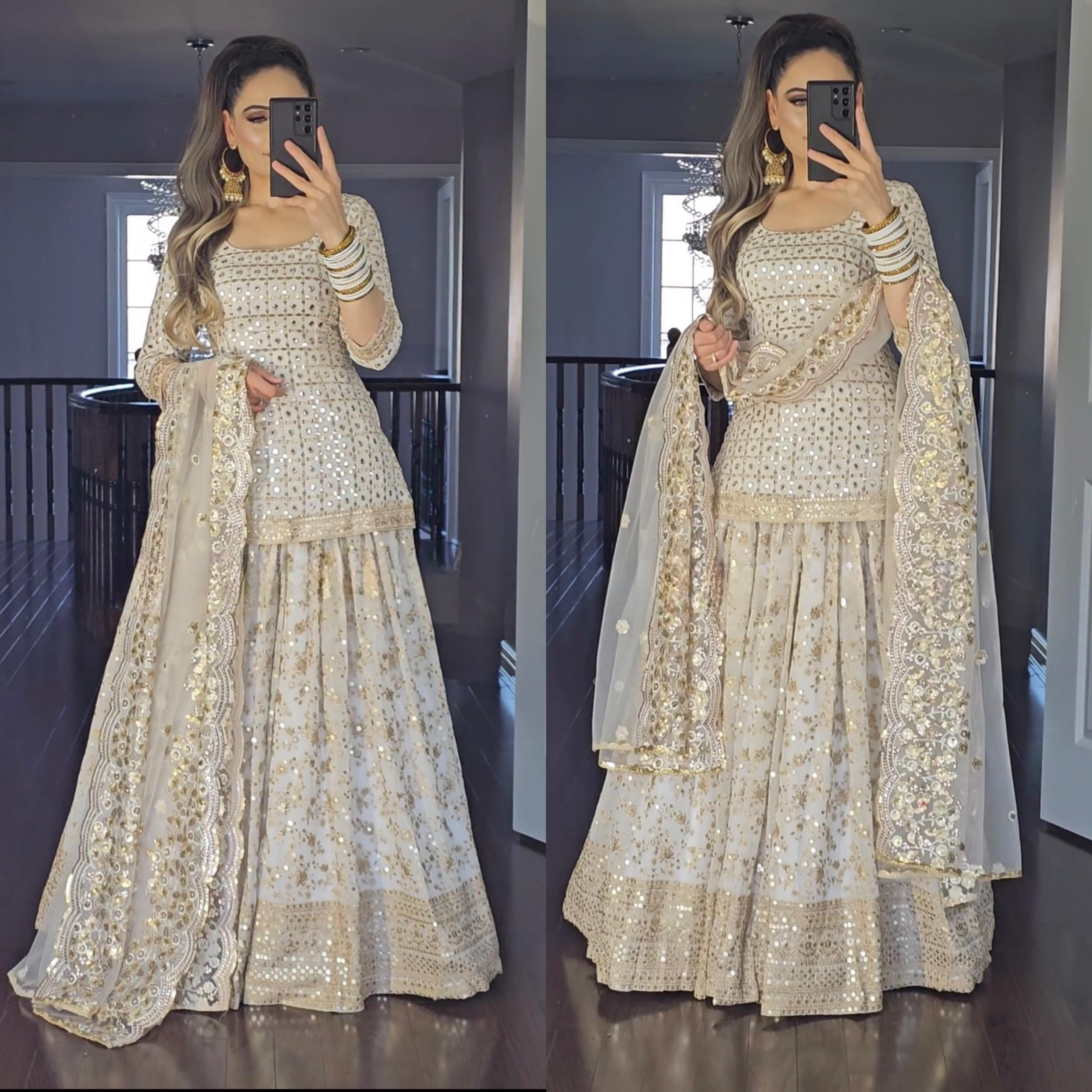 Captivating Embroidery Work White Color Lehenga Suit