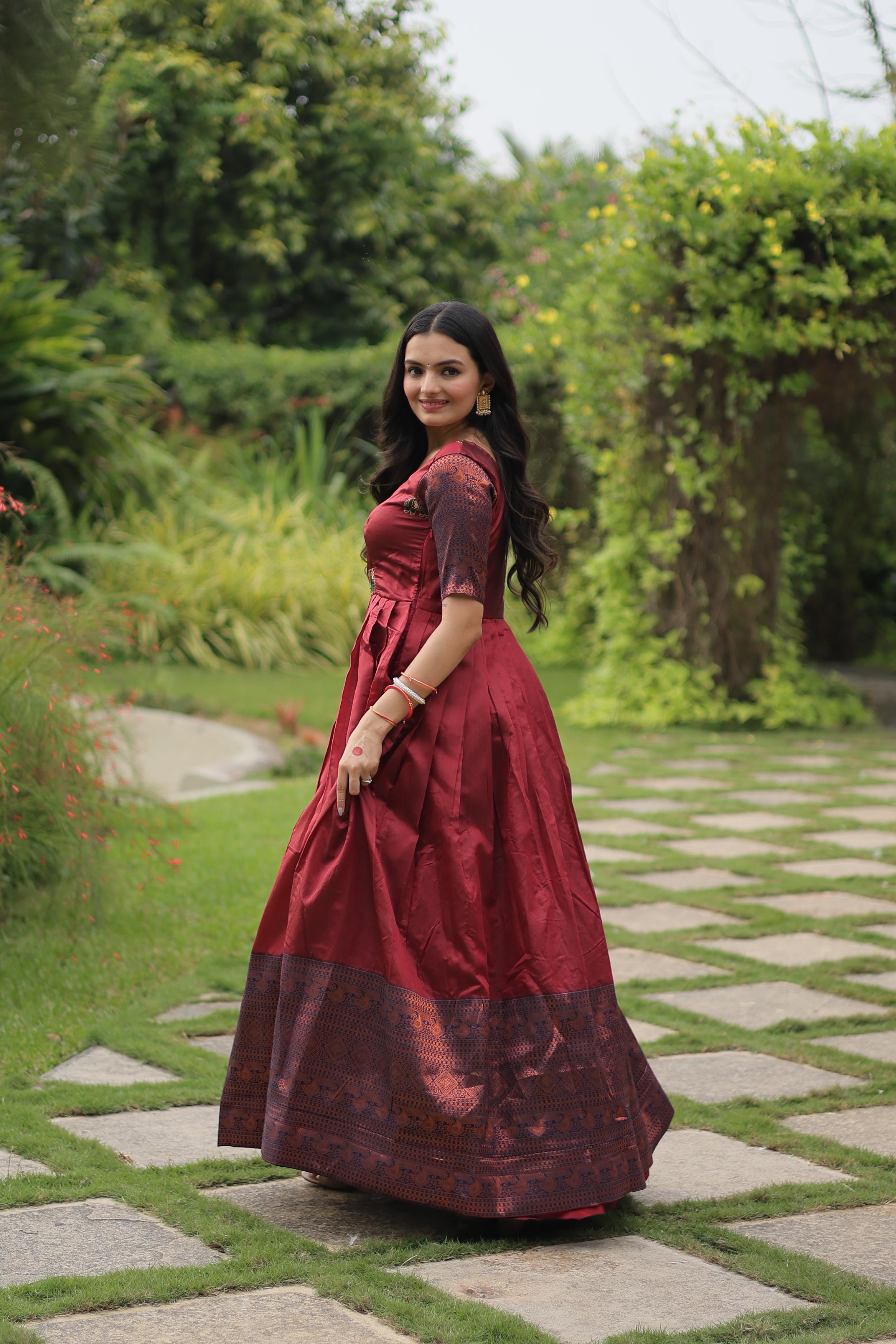 Festive Wear Maroon Color Jacquard Silk Gown