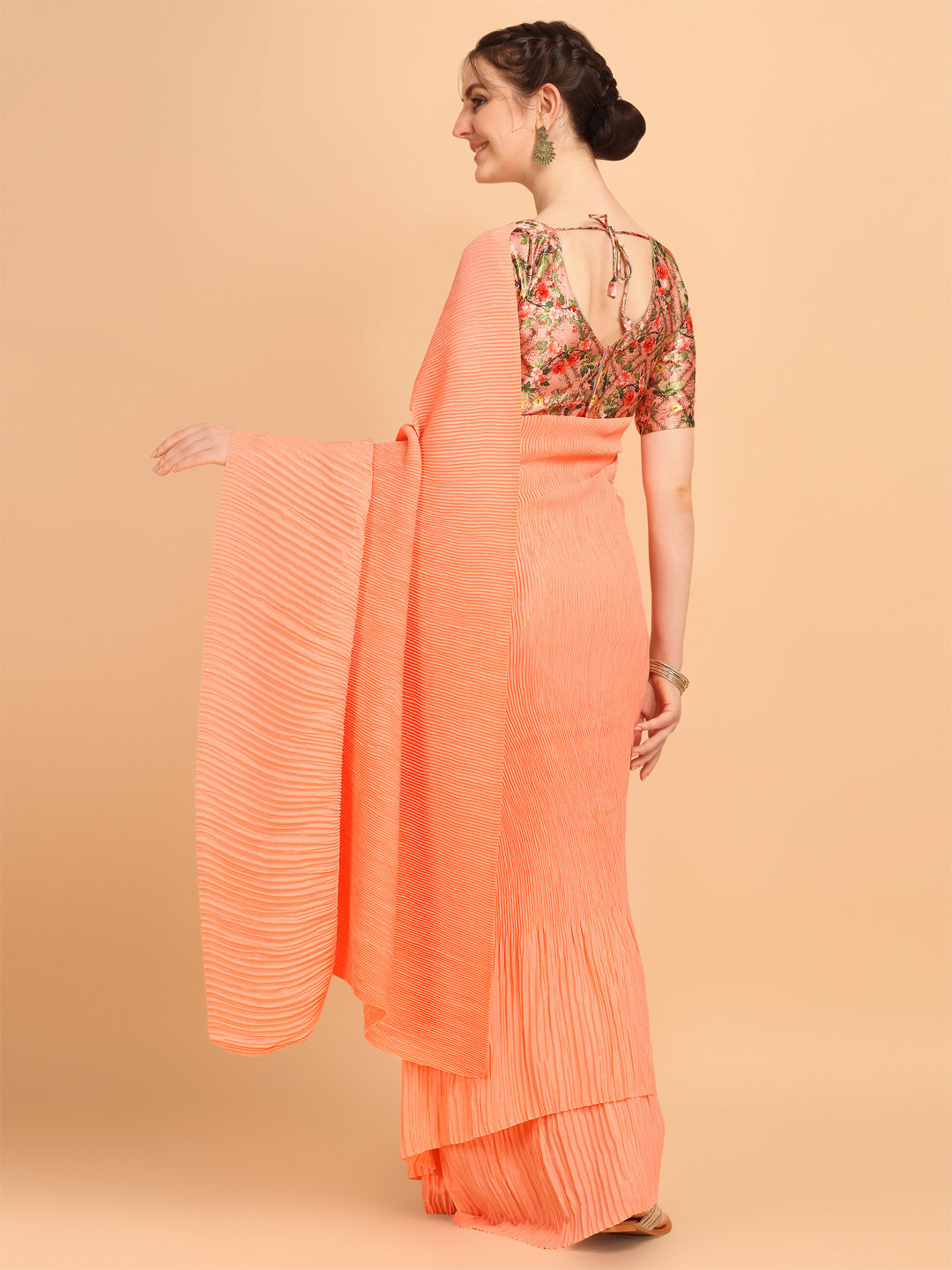 Good Looking Orange Color Pleated Saree