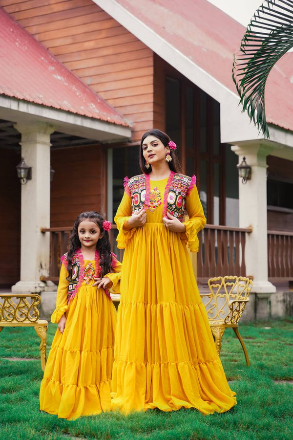 Pretty Mother Daughter Yellow Color Ruffle Gown With Koti