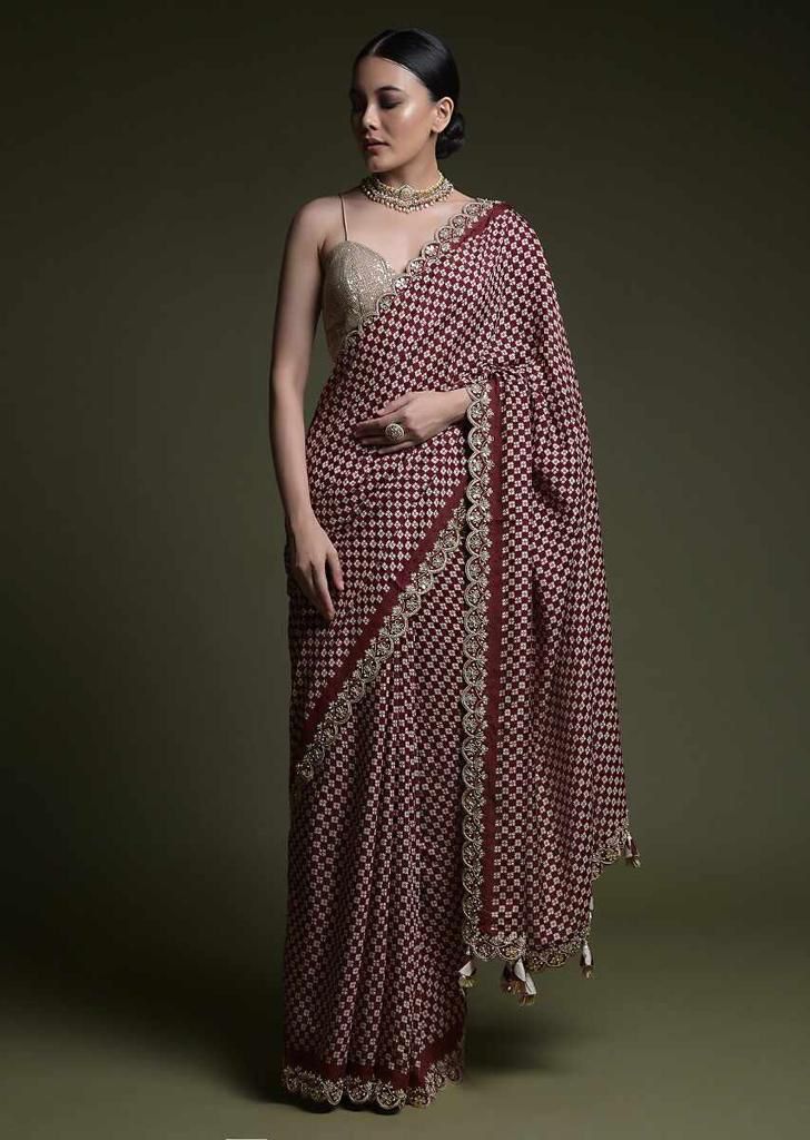 Eyes Catching Print With Border Maroon Color Saree