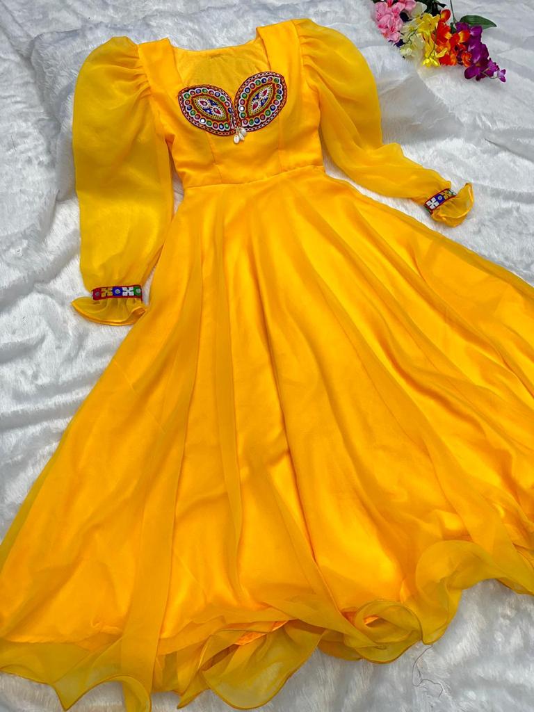 Presenting Yellow Color Thread Mirror Work Gown