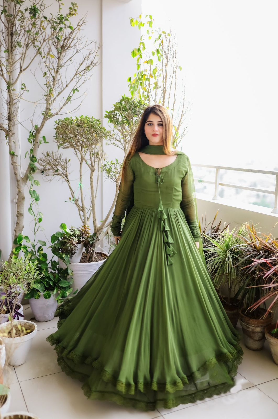 Superhit Mehendi Green Color Two Layer Gown