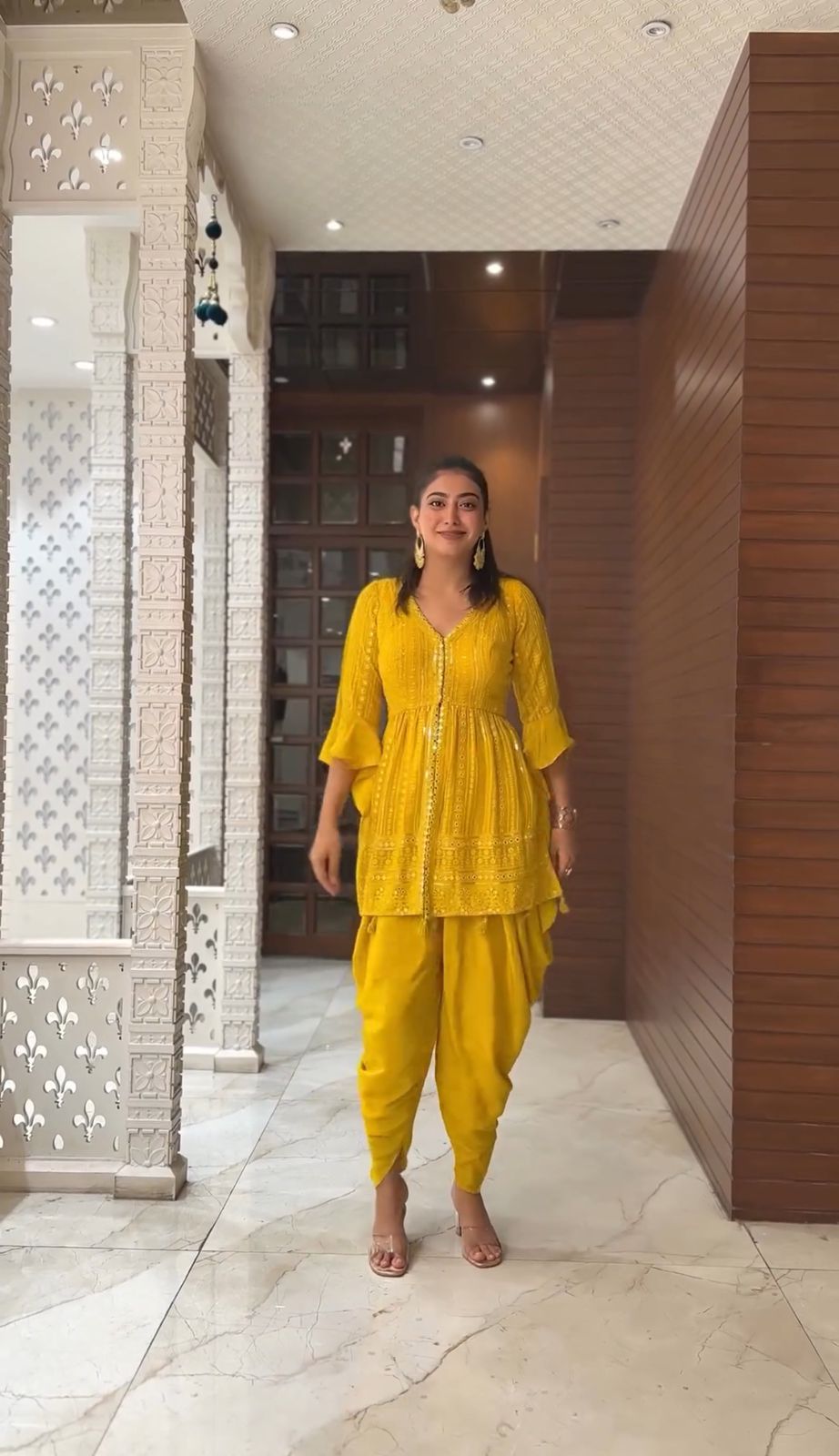 Sun Yellow Dhoti Suit With Layered Peplum Top Having Colorful Resham  Flowers And Overlapping Neckline Online - Kalki Fashion | Designer outfits  woman, Party wear indian dresses, Traditional indian dress