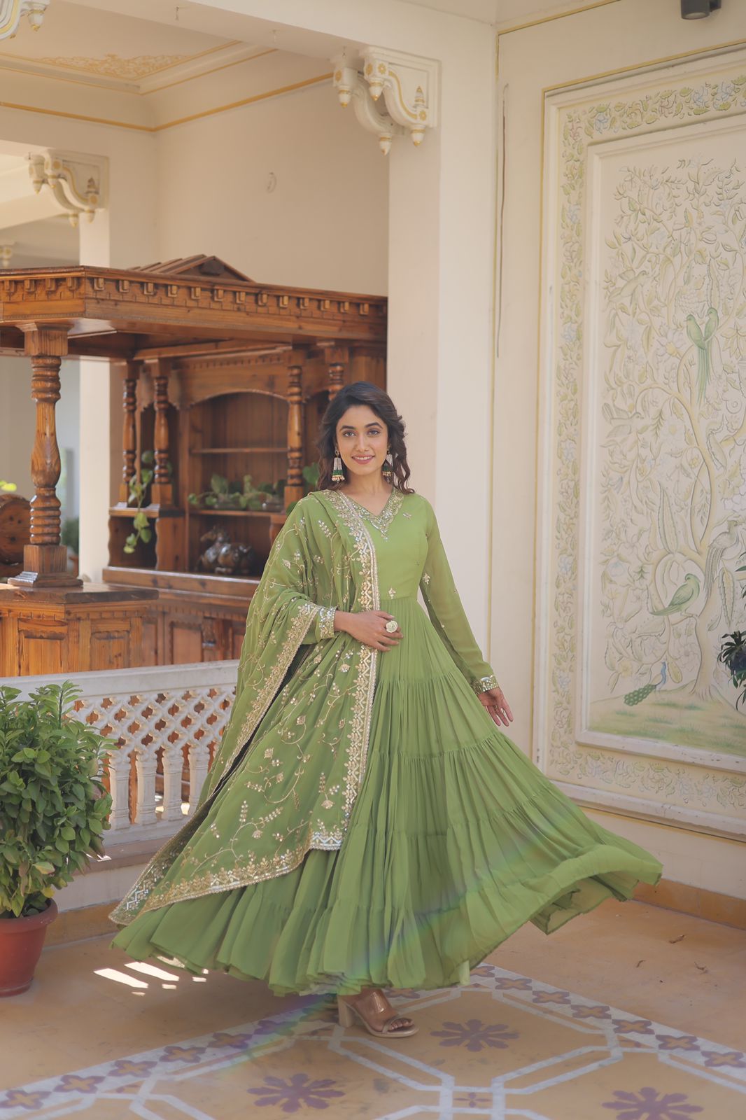 Luxuriant Ruffle Parrot Green Gown With Work Dupatta