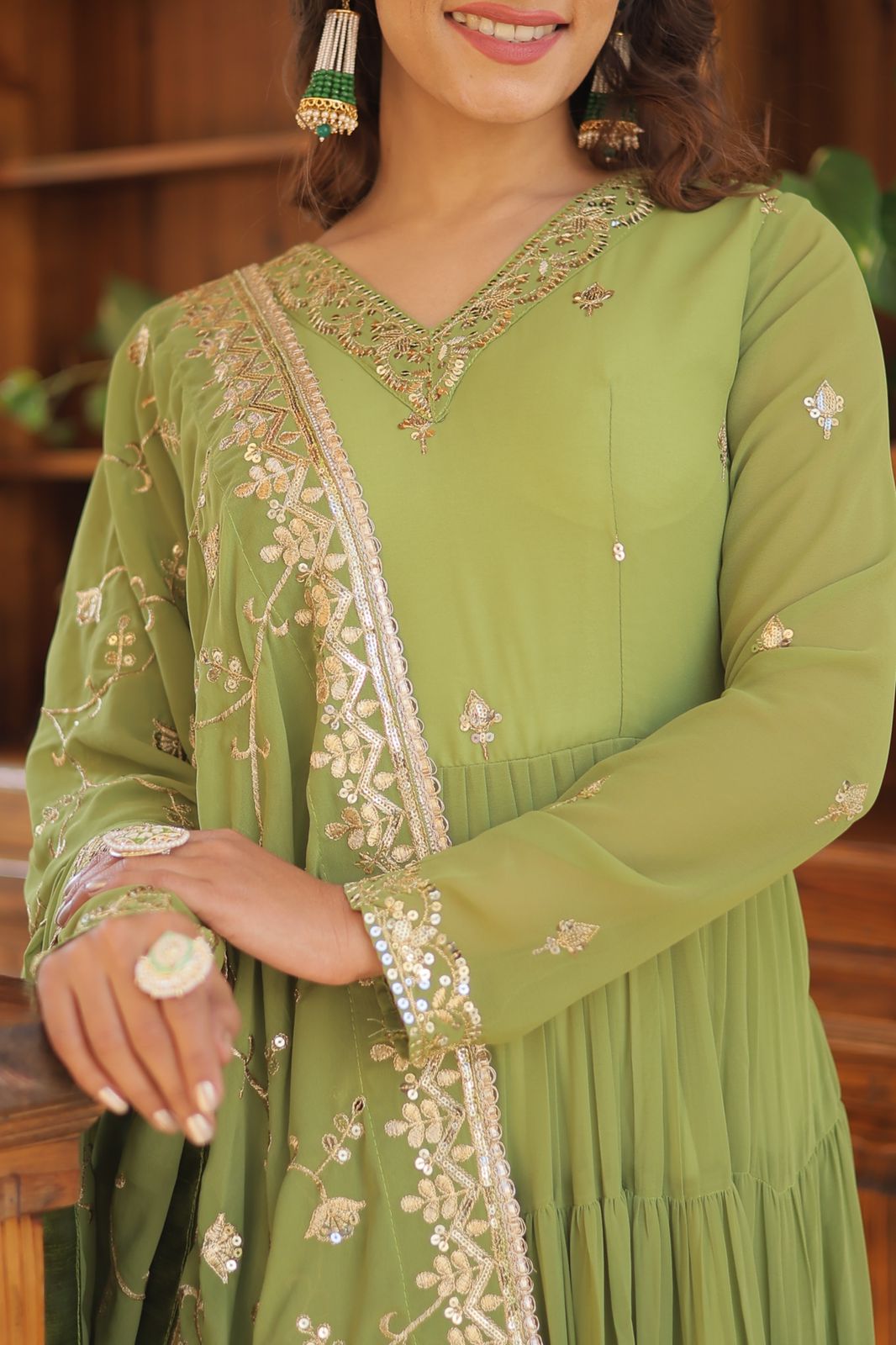 Luxuriant Ruffle Parrot Green Gown With Work Dupatta