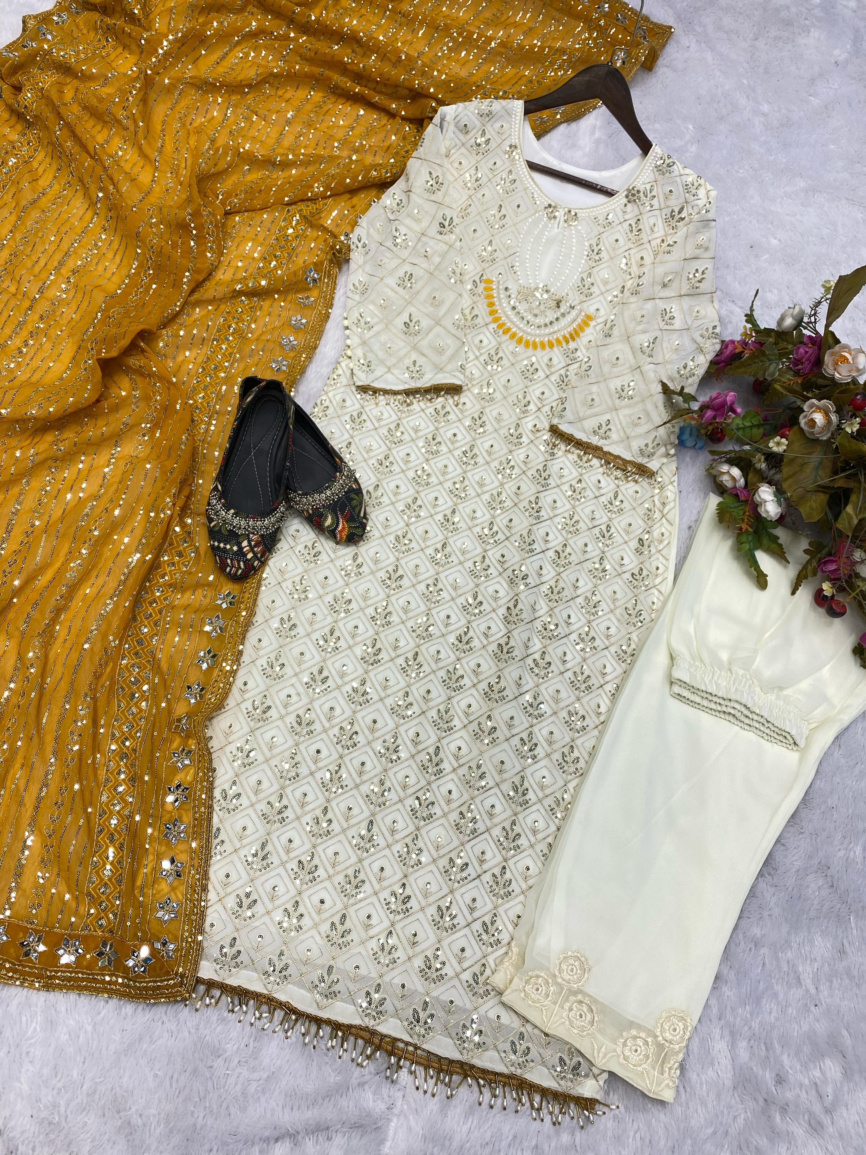 Pretty Sequence Work White Color Suit With Mustard Dupatta