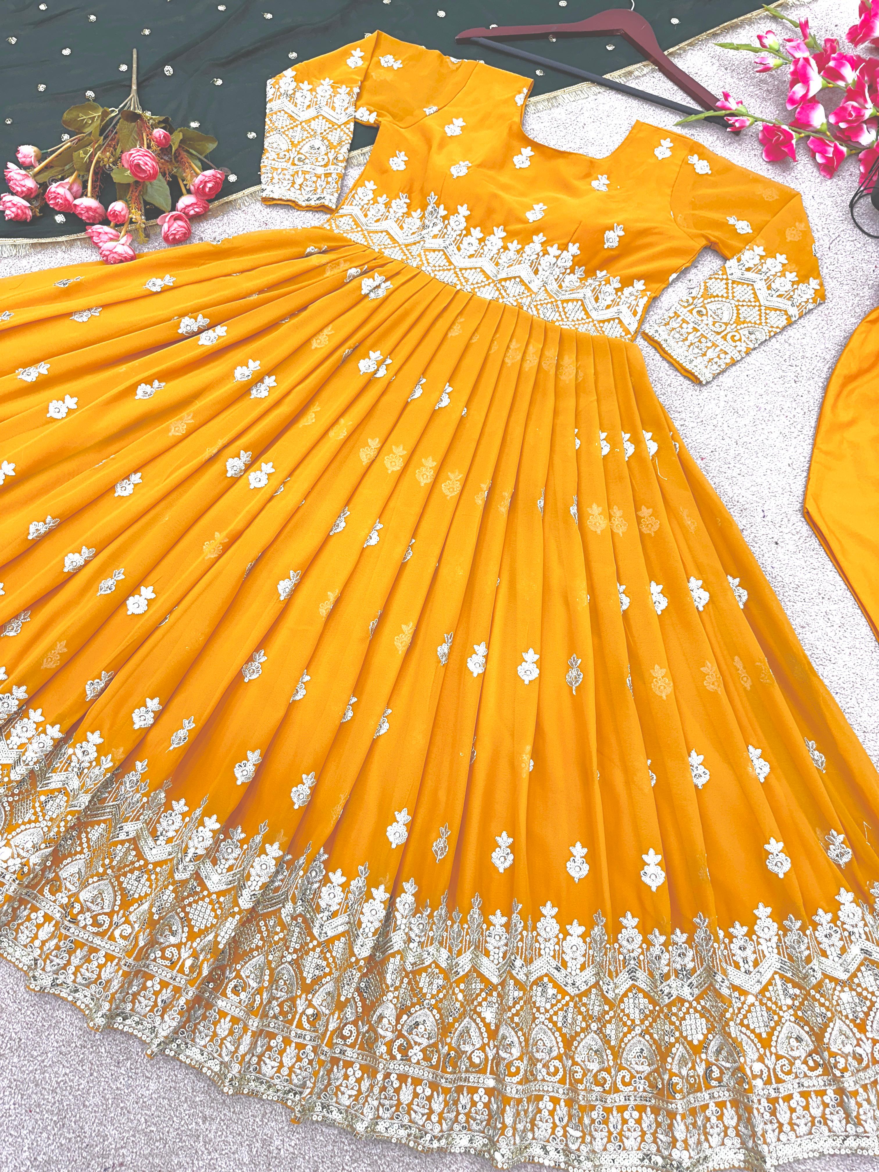 Opulent Yellow Sequence Work Gown With Green Dupatta