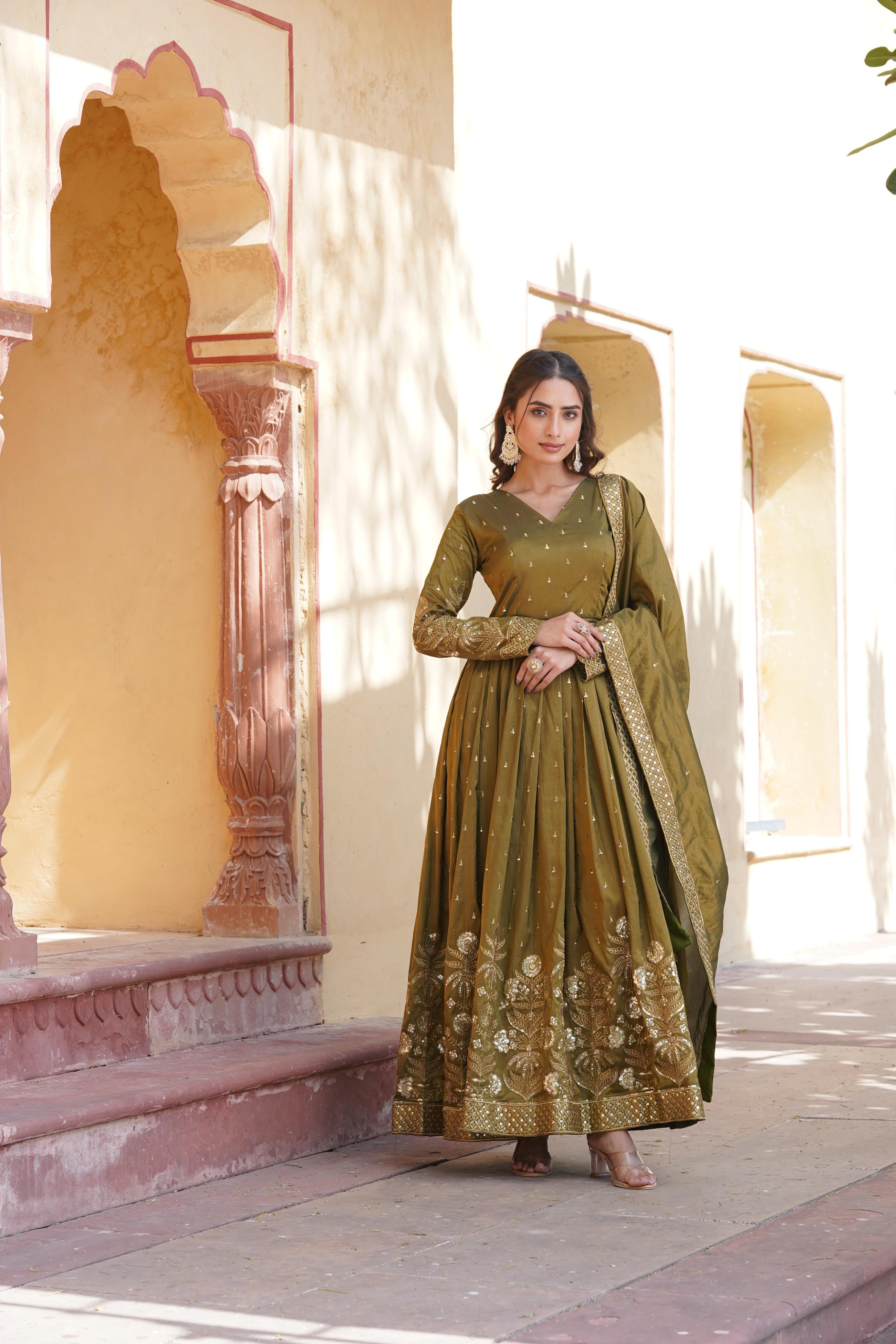 Luxuriant Zari Embroidery Work Mehndi Color Gown