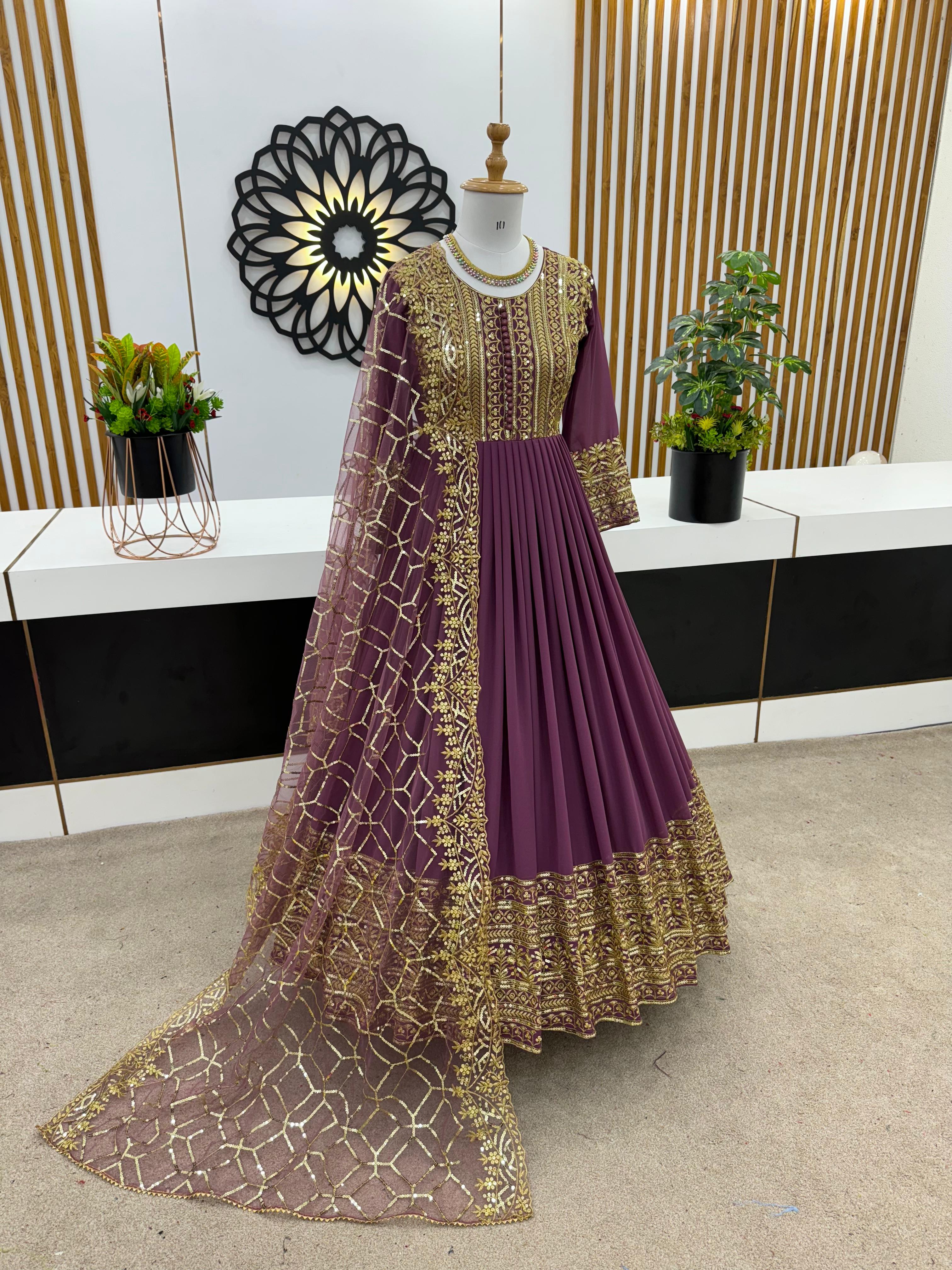 Fabulous Purple Color Embroidery Work Gown