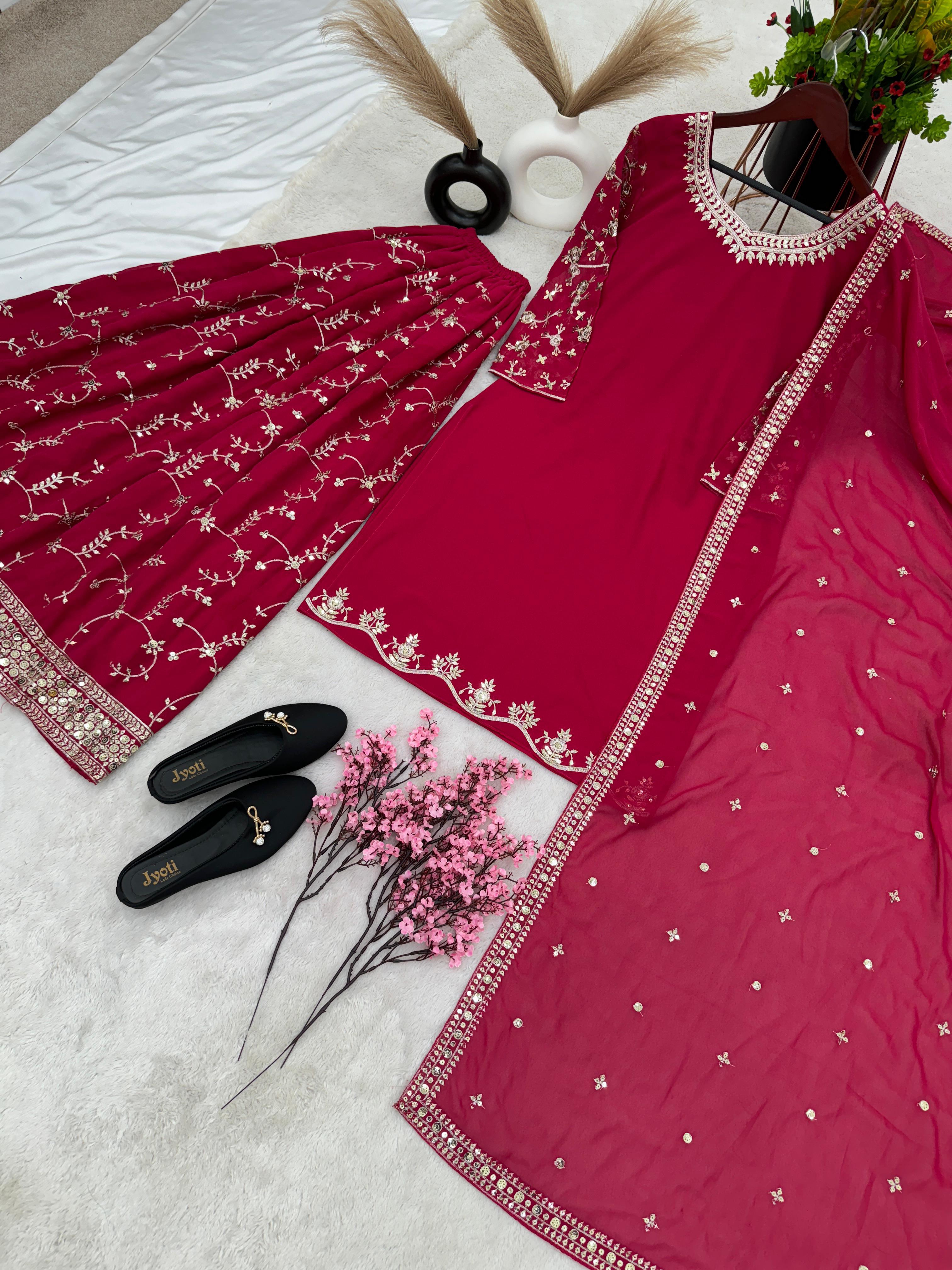 Imposing Embroidery Work Pink Sharara Suit