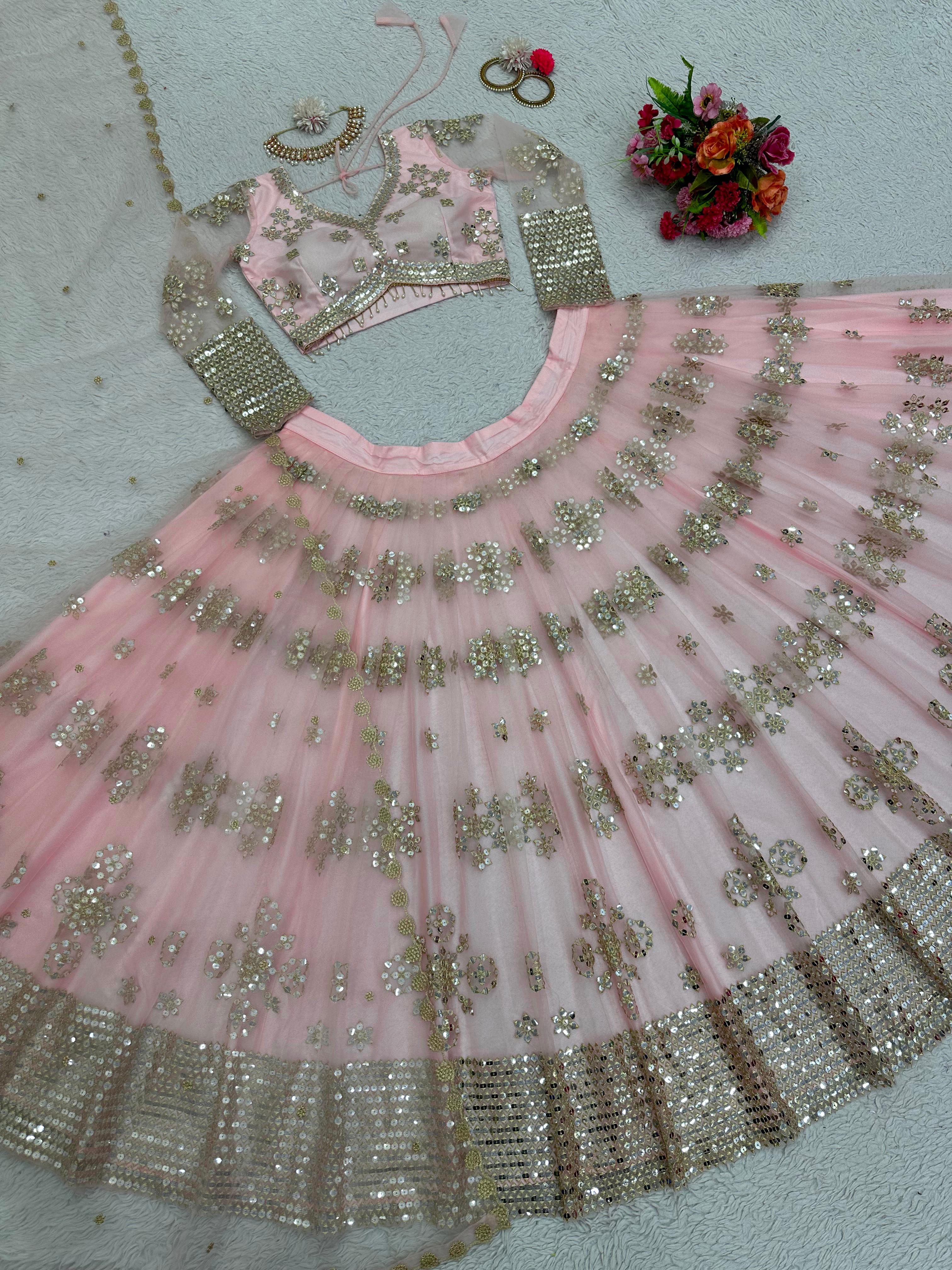 Ravishing Sequence Work Light Pink Net Lehenga Choli