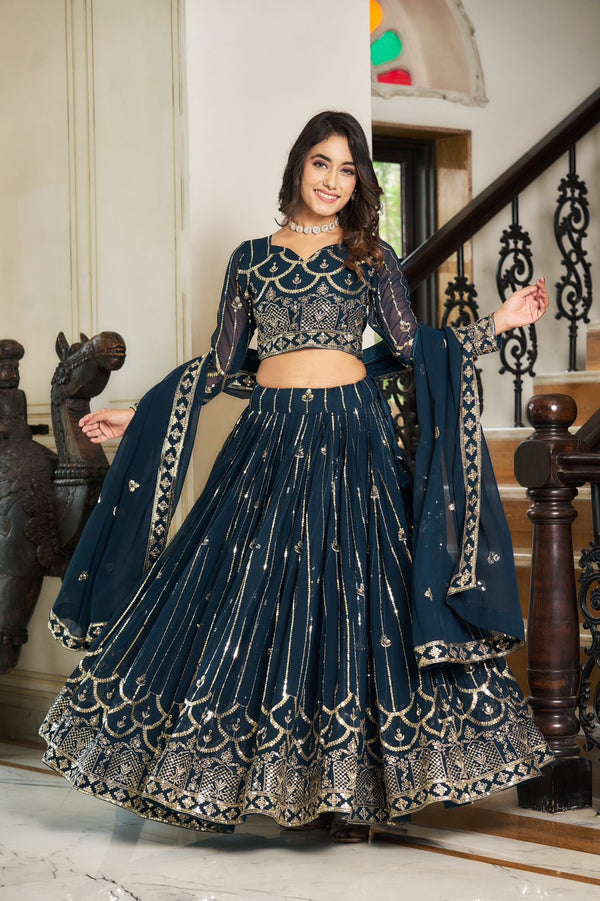 Ceremony Wear Teal Blue Color Heavy Faux Georgette And Embroidery Sequence Work Designer Lehenga Choli