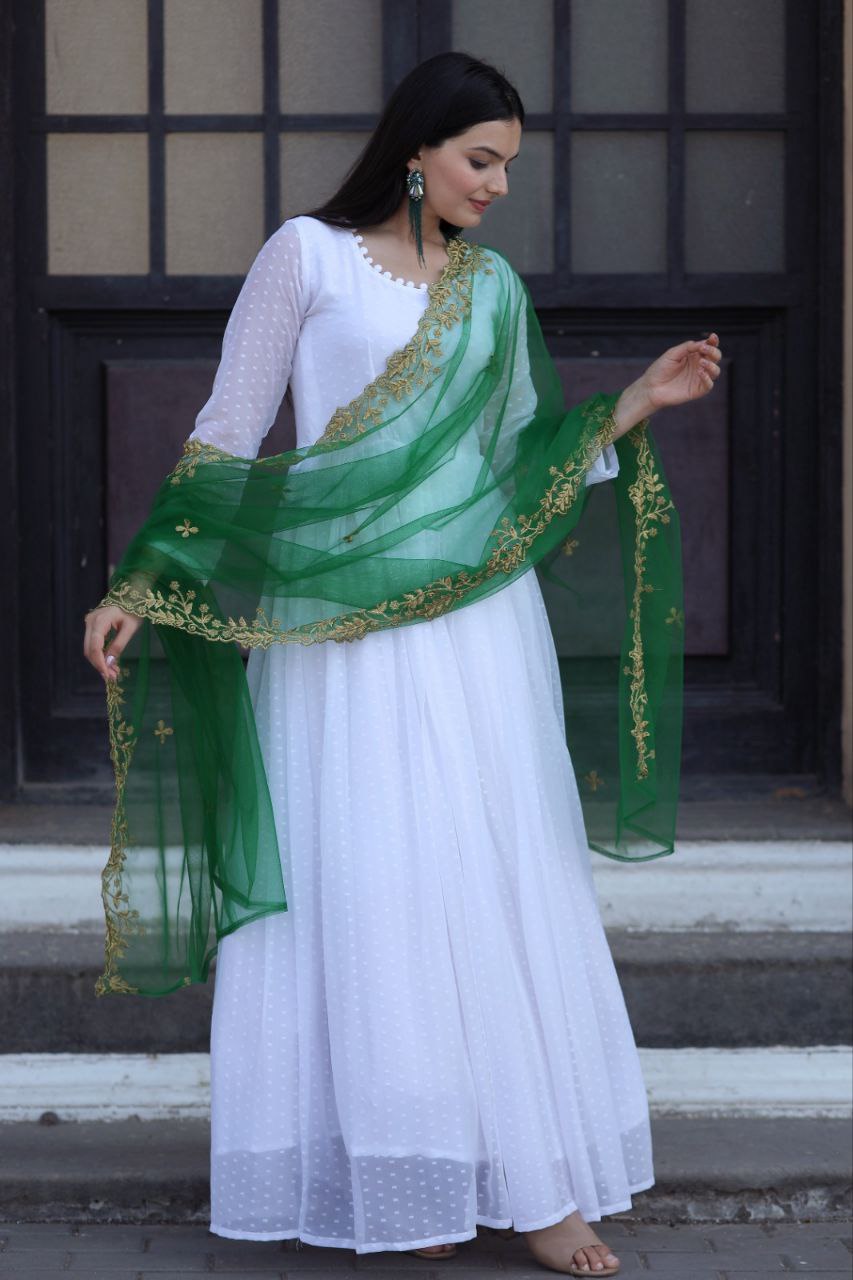 Admiring Green Color Gown With Yellow Dupatta