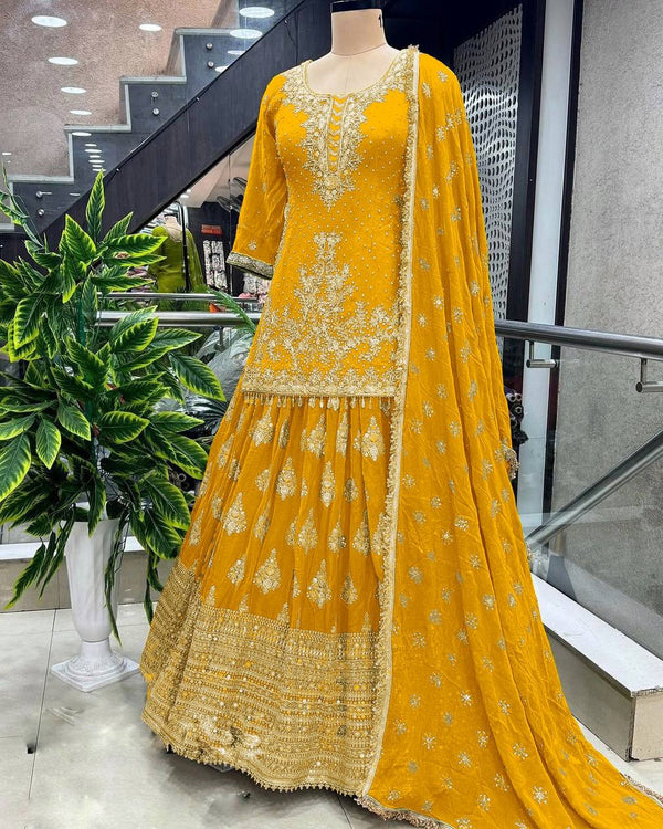 Yellow Ceremony Wear Embroidery Work Lehenga With Top