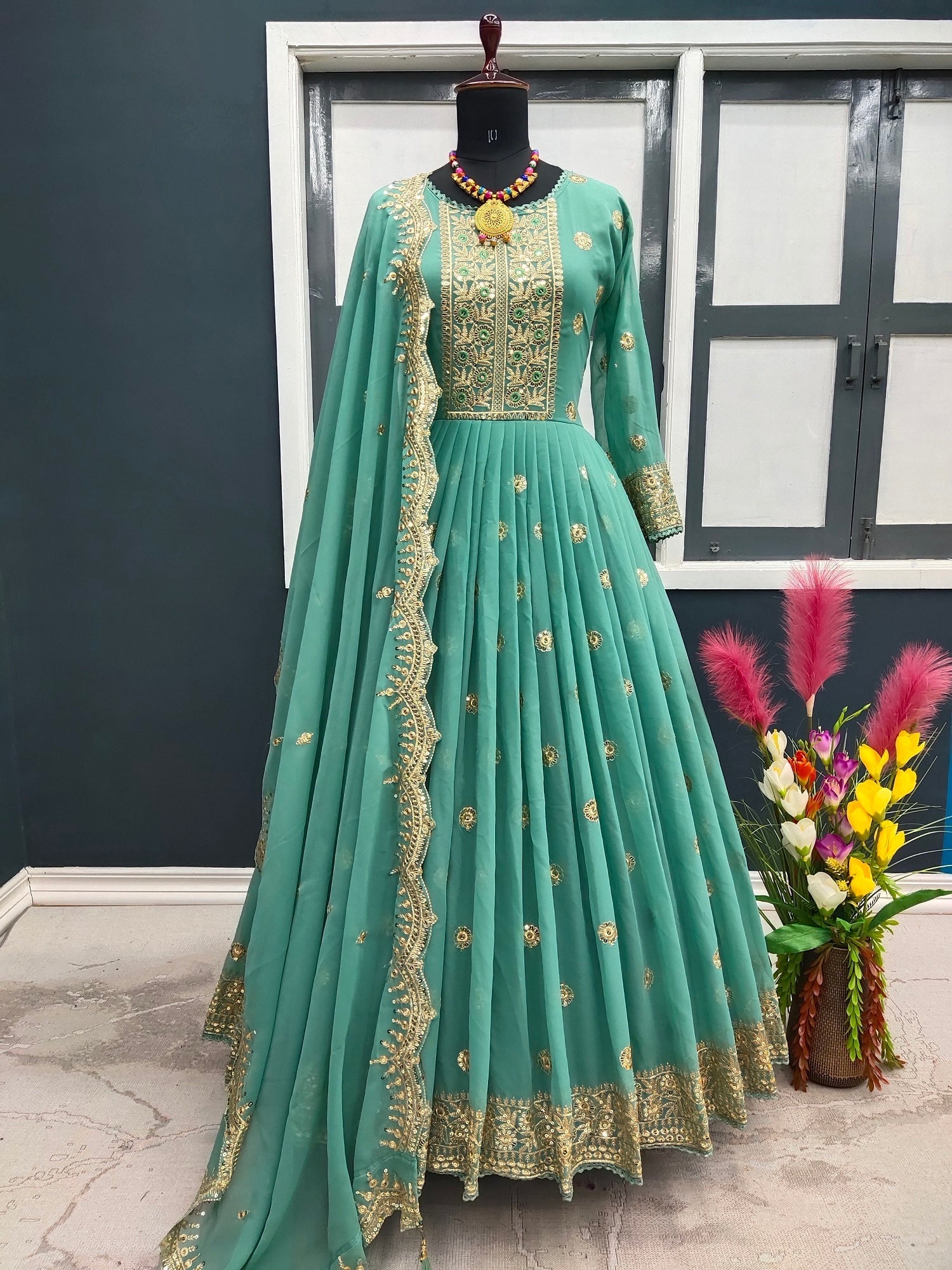 Designer Pista Green Color Embroidery Work Gown
