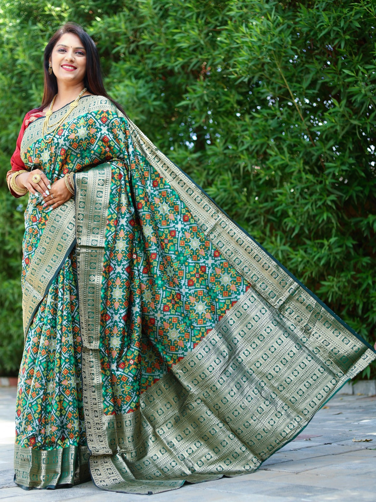 Fashionable Green Color All Over Zari Patola Weaving Saree