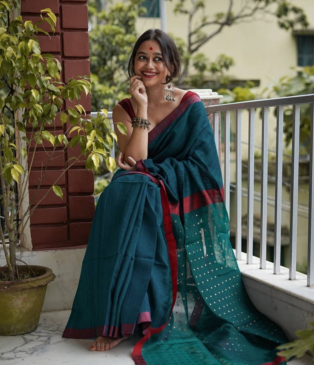 Marvelous Dark Green With Red Woven Border Saree
