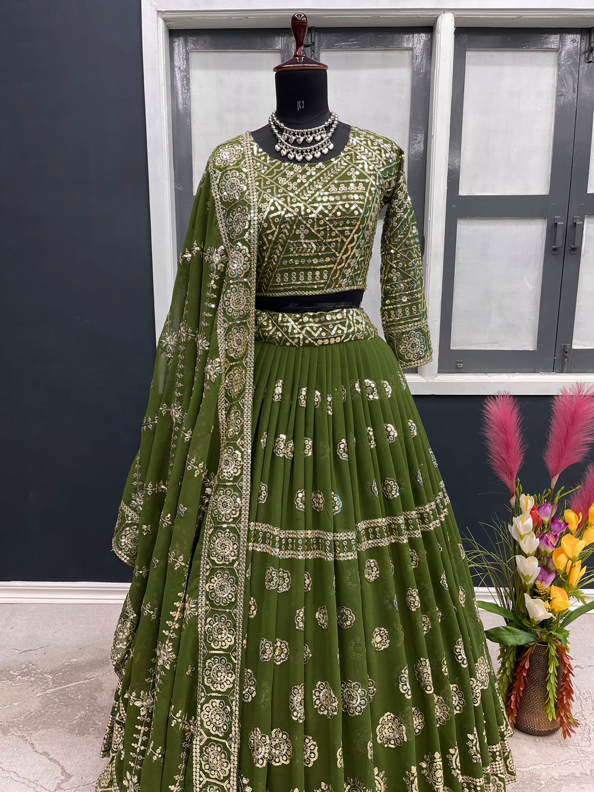 Stylish Mehendi Color Sequence Work Lehenga Choli