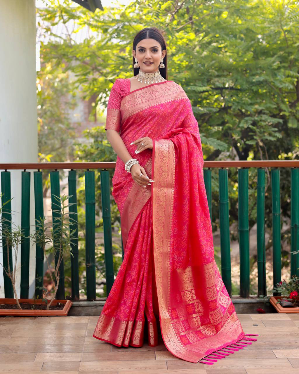 Bandhej Designed Zari Patola Weaving Pink Saree