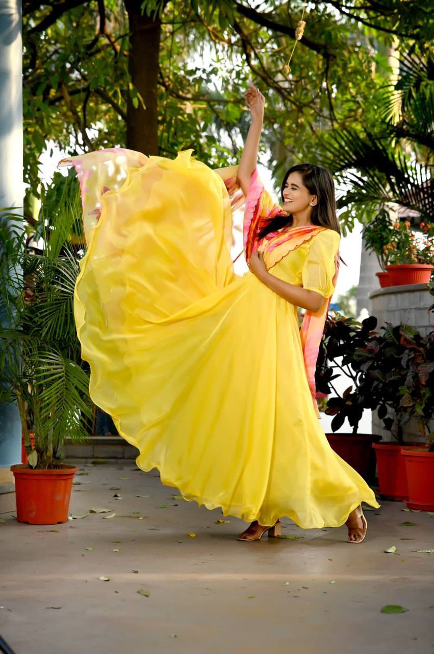 Yellow Color Plain Gown With Print Dupatta